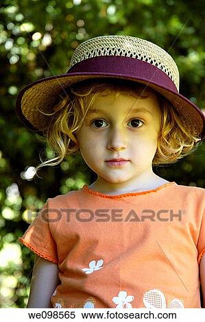 France provence portrait of a smiling little girl wearing her mother s straw hat View Large Photo Image Stock Photography - France provence portrait of a smiling little girl wearing her mother s straw hat. Fotosearch