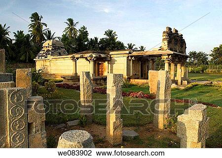 Ganigitti Jaina temple (1368 A. D) in Hampi, Karnataka. Irugappa's Basti called Ganigitti Jinalaya (dedicated Kunthunatha, 17th Thirthankara of the Jain) in Hampi, Karnataka. Ganigitti temple means æthe oil women's temple. In front of the main temple is th View Large Photo Image Stock Image - Ganigitti Jaina temple (1368 A. D) in Hampi, Karnataka. Irugappa's Basti called Ganigitti Jinalaya (dedicated Kunthunatha, 17th Thirthankara of the Jain) in Hampi, Karnataka. Ganigitti temple means æthe oil women's temple. In front of the main temple is th. Fotosearch