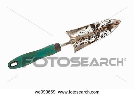 Gardening trowel photographed on a white background with a clipping path View Large Photo Image Stock Photo - Gardening trowel photographed on a white background with a clipping path. Fotosearch