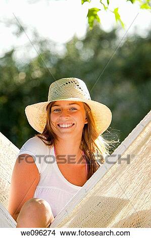 Girl in hammock View Large Photo Image Picture - Girl in hammock. Fotosearch