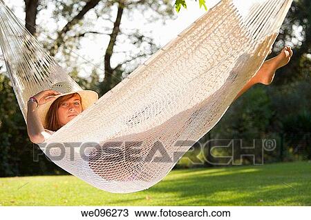 Girl in hammock View Large Photo Image Stock Image - Girl in hammock. Fotosearch