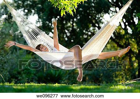 Girl in hammock View Large Photo Image Stock Photo - Girl in hammock. Fotosearch