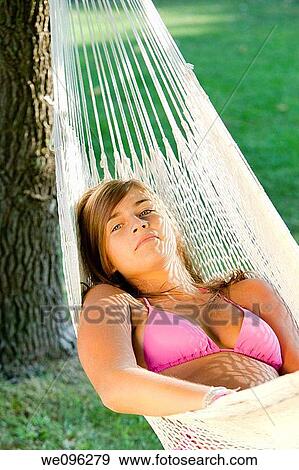 Girl in hammock View Large Photo Image Stock Photo - Girl in hammock. Fotosearch