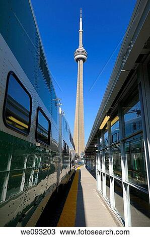 GO train at Union Station Toronto with CN Tower in the morning View Large Photo Image Stock Image - GO train at Union Station Toronto with CN Tower in the morning. Fotosearch