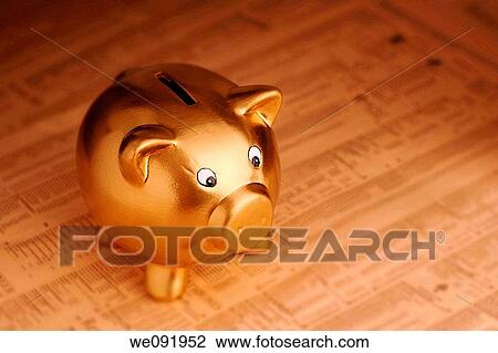 Gold piggy bank on financial newspaper View Large Photo Image Stock Image - Gold piggy bank on financial newspaper. Fotosearch