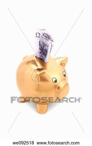 Gold piggy bank with pound notes View Large Photo Image Stock Photo - Gold piggy bank with pound notes. Fotosearch