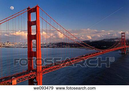 Golden Gate suspension bridge and San Francisco skyline with moon at sunset View Large Photo Image Stock Photo - Golden Gate suspension bridge and San Francisco skyline with moon at sunset. Fotosearch
