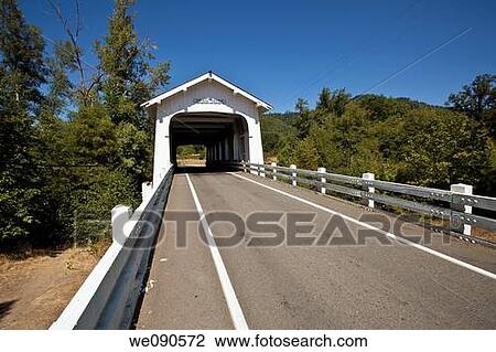 Grave Creek covered span at Sunny Valley, about 15 miles north of Grants Pass, can be seen by motorists traveling Interstate 5 View Large Photo Image Stock Image - Grave Creek covered span at Sunny Valley, about 15 miles north of Grants Pass, can be seen by motorists traveling Interstate 5. Fotosearch