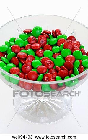 Green and red chocolate Christmas candies in a crystal bowl on white background View Large Photo Image Stock Image - Green and red chocolate Christmas candies in a crystal bowl on white background. Fotosearch