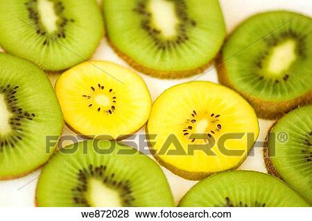 Green and Yellow Kiwi Slices Served on a Plate View Large Photo Image Stock Photo - Green and Yellow Kiwi Slices Served on a Plate. Fotosearch