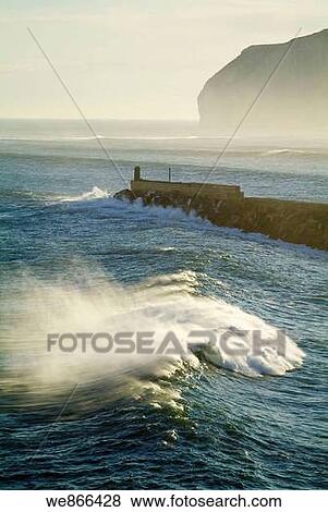 Groyne of Bermeo and Ogo±o cape in background, Biscay, Basque Country, Spain View Large Photo Image Stock Photo - Groyne of Bermeo and Ogo±o cape in background, Biscay, Basque Country, Spain. Fotosearch