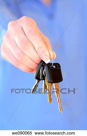 Hands holding car keys View Large Photo Image Stock Photography - Hands holding car keys. Fotosearch