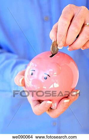 Hands holding piggy bank View Large Photo Image Picture - Hands holding piggy bank. Fotosearch