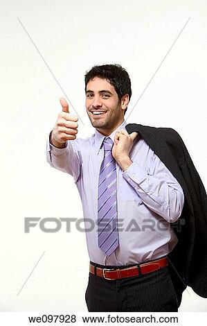 Happy business man giving thumbs up on white background View Large Photo Image Stock Photo - Happy business man giving thumbs up on white background. Fotosearch