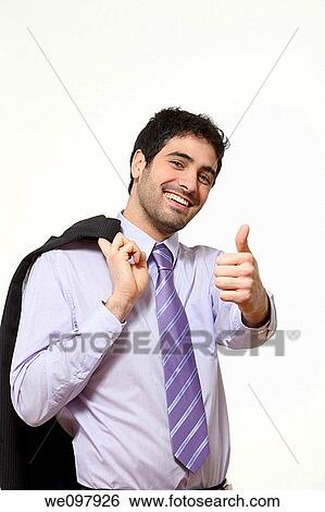 Happy business man giving thumbs up on white background View Large Photo Image Stock Photograph - Happy business man giving thumbs up on white background. Fotosearch