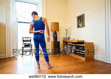 Hispanic man posing in his living room View Large Photo Image Stock Image - Hispanic man posing in his living room. Fotosearch