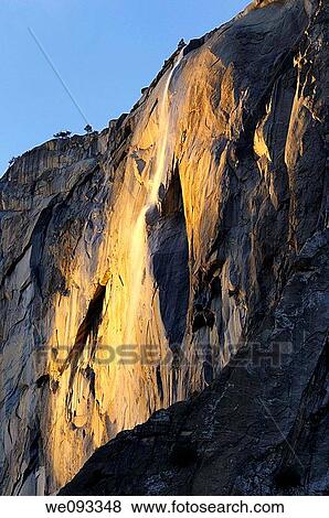 Horse Tail Fall on El Capitan lit by the last orange rays of sunlight in Yosemite National Park View Large Photo Image Stock Photo - Horse Tail Fall on El Capitan lit by the last orange rays of sunlight in Yosemite National Park. Fotosearch