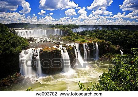 Iguassu Falls is the largest series of waterfalls on the planet, located in Brazil, Argentina, and Paraguay At some times during the year one can see as many as 275 separate waterfalls cascading along the edges of 2, 700 meters 1 6 miles cliffs Argentine View Large Photo Image Stock Image - Iguassu Falls is the largest series of waterfalls on the planet, located in Brazil, Argentina, and Paraguay At some times during the year one can see as many as 275 separate waterfalls cascading along the edges of 2, 700 meters 1 6 miles cliffs Argentine. Fotosearch