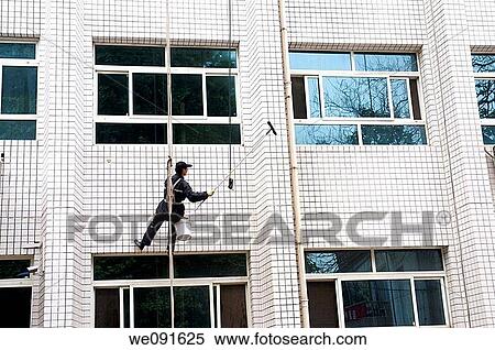 In September 2009, China Luoyang, Henan Building exterior cleaning View Large Photo Image Stock Photography - In September 2009, China Luoyang, Henan Building exterior cleaning. Fotosearch