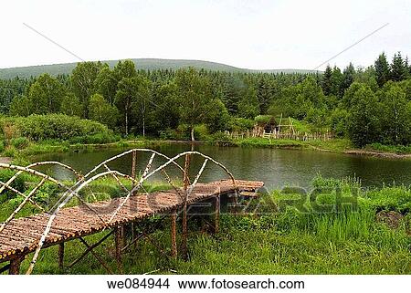 July 2006, the Chinese landscape in China's Inner Mongolia grassland Pool landscape View Large Photo Image Picture - July 2006, the Chinese landscape in China's Inner Mongolia grassland Pool landscape. Fotosearch