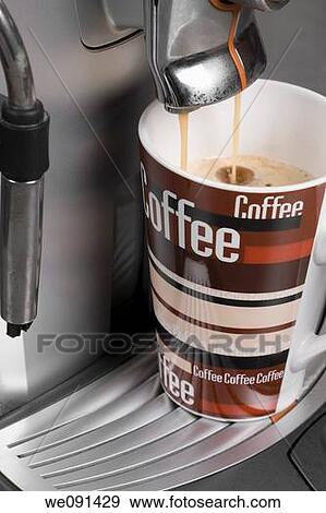 Stock Photo - Kaffeetasse und Kaffeebohnen / Coffeebeans and a cup of coffee. Fotosearch