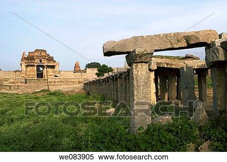 Krishna Temple entrance Gopuram(1515AD) and Bazaar in Hampi, Karnataka. This partly collapsed temple, located south of Hemakuta Hill, was built to celebrate a military victory of King Krishnadevaraya (1515 A. D). View Large Photo Image Stock Photography - Krishna Temple entrance Gopuram(1515AD) and Bazaar in Hampi, Karnataka. This partly collapsed temple, located south of Hemakuta Hill, was built to celebrate a military victory of King Krishnadevaraya (1515 A. D).. Fotosearch