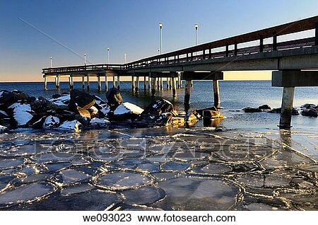 Lake Ontario blue sky sunset at Toronto Center Island Pier in winter with ice flow tiles View Large Photo Image Stock Image - Lake Ontario blue sky sunset at Toronto Center Island Pier in winter with ice flow tiles. Fotosearch