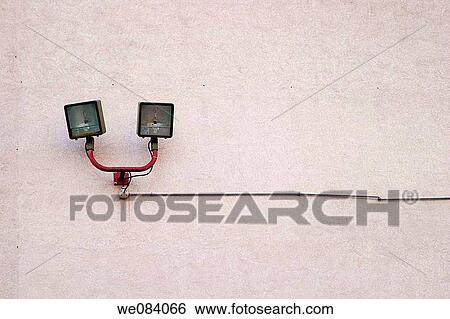 Lights attached to the exterior wall of an office building. View Large Photo Image Stock Photograph - Lights attached to the exterior wall of an office building.. Fotosearch