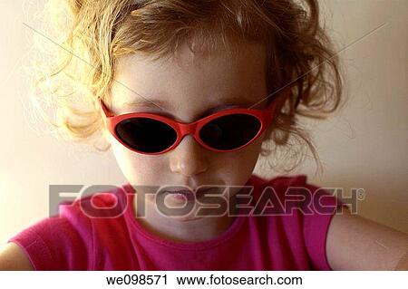 Little girl wearing sunglasses View Large Photo Image Stock Image - Little girl wearing sunglasses. Fotosearch