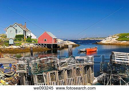 Lobster traps and rope on the wharf in the quiet fishing village of Peggys Cove Nova Scotia View Large Photo Image Stock Photography - Lobster traps and rope on the wharf in the quiet fishing village of Peggys Cove Nova Scotia. Fotosearch