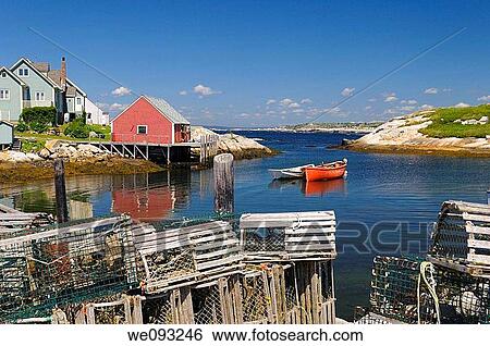 Lobster traps on the wharf in the quiet fishing village of Peggys Cove Nova Scotia View Large Photo Image Stock Photograph - Lobster traps on the wharf in the quiet fishing village of Peggys Cove Nova Scotia. Fotosearch