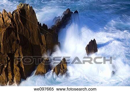 long exposure of ocean surf splashing against rock, View Large Photo Image Stock Photography - long exposure of ocean surf splashing against rock,. Fotosearch