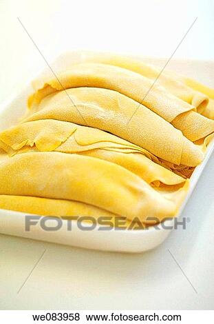 Making fresh pasta in Italy View Large Photo Image Stock Photo - Making fresh pasta in Italy. Fotosearch