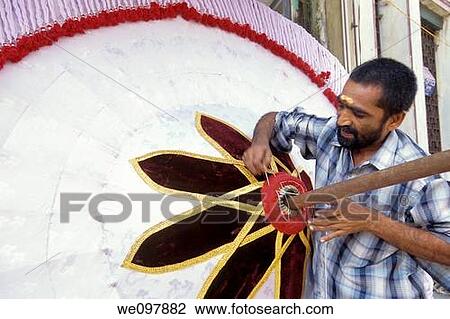 Making temple umbrellas in Chindadripet, Chennai, Madras, Tamil Nadu View Large Photo Image Stock Image - Making temple umbrellas in Chindadripet, Chennai, Madras, Tamil Nadu. Fotosearch