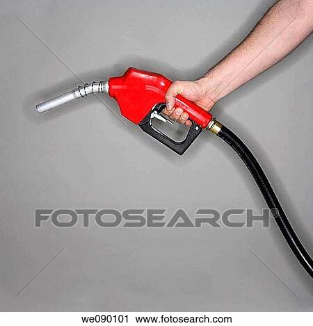 Man holding gas nozzle View Large Photo Image Stock Image - Man holding gas nozzle. Fotosearch