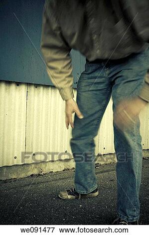 Man in front of an old outdoor wall View Large Photo Image Stock Photo - Man in front of an old outdoor wall. Fotosearch