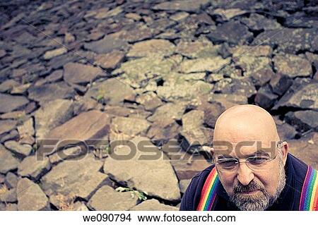 Picture - Middle-age man wearing glasses. Fotosearch