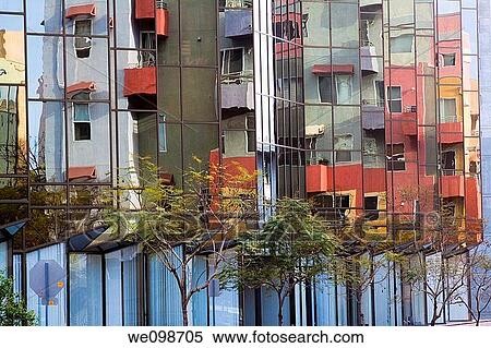 Mirror windows reflecting a colorful modern residential building in Little Italy section of San Diego, California, USA. View Large Photo Image Stock Photography - Mirror windows reflecting a colorful modern residential building in Little Italy section of San Diego, California, USA.. Fotosearch
