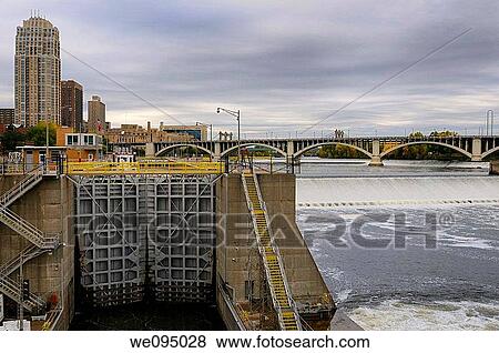 Mississippi river Ford Lock and Dam Number 1 in Minneapolis with St Anthony Falls and Third Avenue bridge View Large Photo Image Stock Photo - Mississippi river Ford Lock and Dam Number 1 in Minneapolis with St Anthony Falls and Third Avenue bridge. Fotosearch