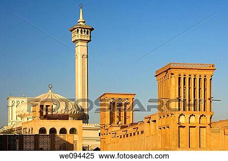 Modern mosque and traditional Arab wind towers in the Bastakiya Quarter, Bur Dubai, Dubai, United Arab Emirates View Large Photo Image Stock Photography - Modern mosque and traditional Arab wind towers in the Bastakiya Quarter, Bur Dubai, Dubai, United Arab Emirates. Fotosearch