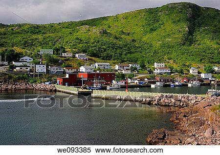 Motorboat entering breakwater at Petty Harbour-Maddox Cove Avalon Peninsula Newfoundland View Large Photo Image Stock Photography - Motorboat entering breakwater at Petty Harbour-Maddox Cove Avalon Peninsula Newfoundland. Fotosearch