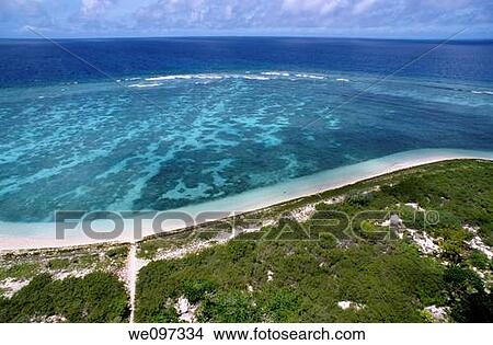 New caledonia noumea lagoon aerial view of a coral reef and its crystal blue water and white sand beach on amedee lighthouse is View Large Photo Image Picture - New caledonia noumea lagoon aerial view of a coral reef and its crystal blue water and white sand beach on amedee lighthouse is. Fotosearch