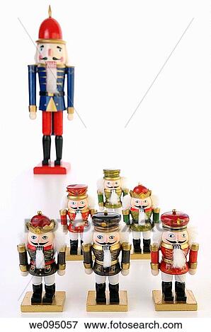 Nutcracker soldier figurines with Captain on white background View Large Photo Image Stock Photo - Nutcracker soldier figurines with Captain on white background. Fotosearch