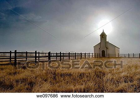 old american chapel in praerie, backlit with sun directly behind steeple View Large Photo Image Stock Photograph - old american chapel in praerie, backlit with sun directly behind steeple. Fotosearch