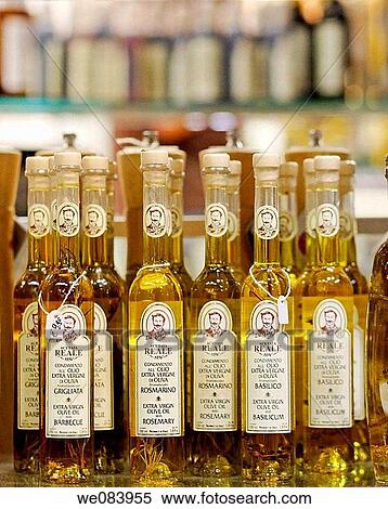 Olive oil bottles on display, Central Market, Florence, Italy View Large Photo Image Stock Photography - Olive oil bottles on display, Central Market, Florence, Italy. Fotosearch