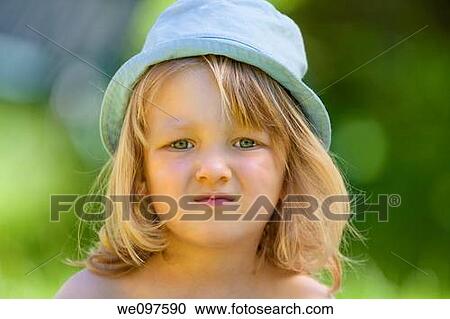 outdoor portrait of a beatiful boy with long blond hair View Large Photo Image Stock Image - outdoor portrait of a beatiful boy with long blond hair. Fotosearch
