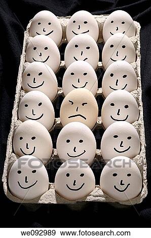 Package of backlit eggs on black cloth with smiling faces except for one grumpy sad face View Large Photo Image Stock Photo - Package of backlit eggs on black cloth with smiling faces except for one grumpy sad face. Fotosearch
