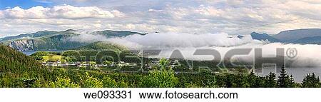 Panorama of low misty cloud a over Bonne Bay at Norris Point Newfoundland in the evening View Large Photo Image Stock Image - Panorama of low misty cloud a over Bonne Bay at Norris Point Newfoundland in the evening. Fotosearch