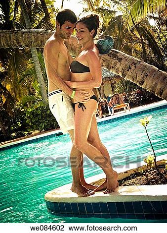 Stock Image - pareja en piscina. Punta Cana. Fotosearch
