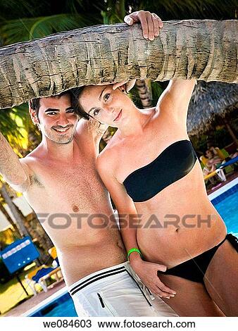 pareja en piscina, Punta Cana (Rep·blica Dominicana) View Large Photo Image Stock Image - pareja en piscina, Punta Cana (Rep·blica Dominicana). Fotosearch